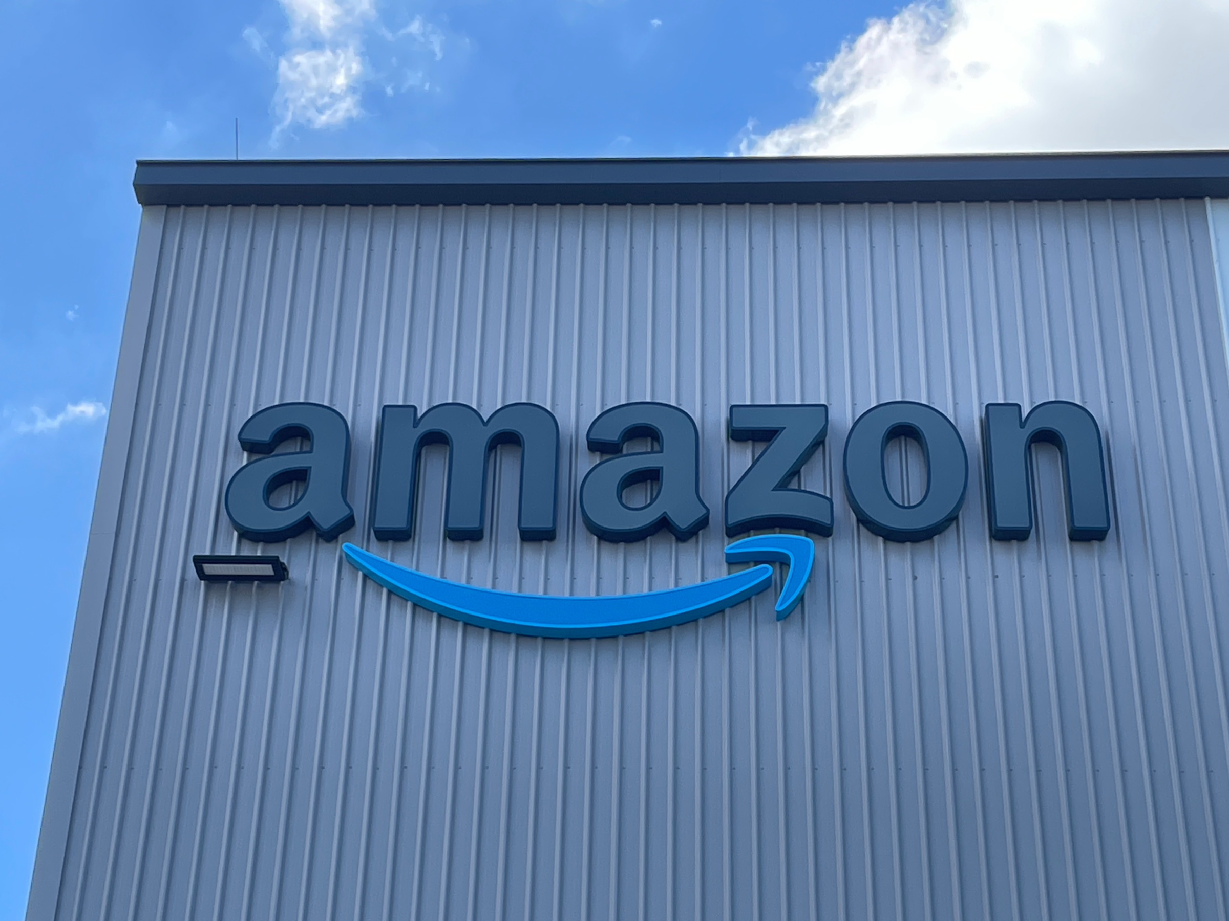 Amazon facade letter signage on a fulfilment centre