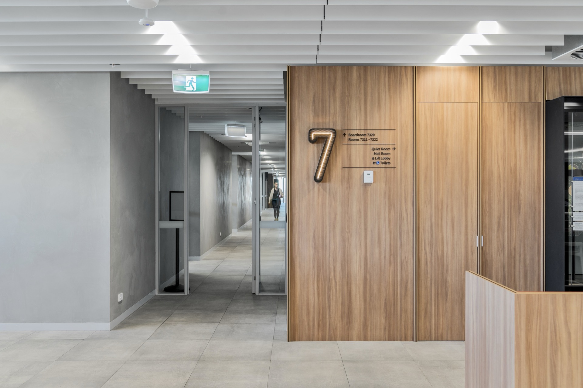 Architectural level identification and wayfinding signage in a university interior